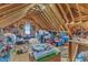 Unfinished attic provides ample storage space and exposed wood beams at 733 Hadrian Dr, Garner, NC 27529