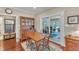Cozy breakfast nook featuring a wooden table, bright light, and easy access to the patio at 733 Hadrian Dr, Garner, NC 27529