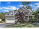 Charming two-story home features a manicured front yard and attached two-car garage at 733 Hadrian Dr, Garner, NC 27529