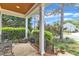 Inviting covered front porch offers iron railings, decorative accents, and a charming outdoor space at 733 Hadrian Dr, Garner, NC 27529