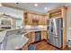 A kitchen featuring stainless steel appliances and beautiful wood cabinetry at 733 Hadrian Dr, Garner, NC 27529