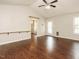 Spacious living room featuring hardwood floors, light gray walls, and ceiling fan at 81 Sallie Dr, Smithfield, NC 27577