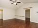 Spacious living room featuring hardwood floors, light gray walls, and ceiling fan at 81 Sallie Dr, Smithfield, NC 27577
