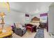 Bedroom featuring a large wood bed, a comfortable recliner, and stylish decor at 820 Nuttree Pl, Raleigh, NC 27606