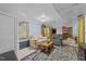 Cozy living room with a classic rug, two sofas, a fireplace, and natural light at 820 Nuttree Pl, Raleigh, NC 27606