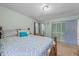 Spacious main bedroom featuring plush bedding and ample closet space at 820 Nuttree Pl, Raleigh, NC 27606
