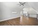 Spacious bonus room with wood-look floors, natural light and an air conditioning unit at 8629 Dukes Lake Rd, Zebulon, NC 27597