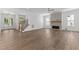 Open-concept living area boasts hardwood floors, a fireplace, and seamless flow to the foyer at 9309 Field Maple Ct, Raleigh, NC 27613