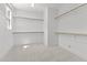 Spacious walk-in closet with ample shelving and bright natural light at 9309 Field Maple Ct, Raleigh, NC 27613