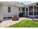 Outdoor living with a patio, fire pit, and screened-in porch at 9404 Dawnshire Rd, Raleigh, NC 27615