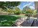 Enjoy the spacious backyard featuring a deck and lush lawn, perfect for entertaining at 9404 Dawnshire Rd, Raleigh, NC 27615
