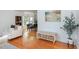Cozy living room with hardwood floors and a charming dining area at 9404 Dawnshire Rd, Raleigh, NC 27615