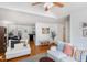 Open-concept living area with hardwood floors, vaulted ceilings, and modern decor at 9404 Dawnshire Rd, Raleigh, NC 27615