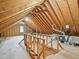 Spacious attic with exposed wooden beams, offering potential for storage or conversion into a unique living space at 104 Montauk Point Pl, Cary, NC 27513