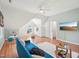 Large bonus room with a ceiling fan, playroom area, and built-in storage at 104 Montauk Point Pl, Cary, NC 27513