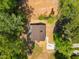 An aerial view highlights the home's roofline, landscaping, and concrete driveway at 106 Circle Dr, Mebane, NC 27302