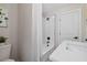 This bathroom boasts a tiled shower, sleek fixtures, and contemporary design, with decorative wall art at 106 Circle Dr, Mebane, NC 27302