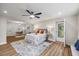 Bright bedroom with an adjoined work area and a door leading to the outside at 106 Circle Dr, Mebane, NC 27302