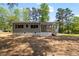 View of a house and yard with a porch at 106 Circle Dr, Mebane, NC 27302