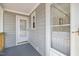 Welcoming screened-in porch with a view of the yard at 106 Circle Dr, Mebane, NC 27302