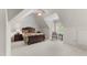 A serene bedroom features a dark wood bed frame and plush carpeting beneath a ceiling fan at 116 Hibiscus Dr, Clayton, NC 27527