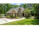 Charming brick home with manicured landscaping and inviting front entrance at 116 Hibiscus Dr, Clayton, NC 27527