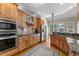 Beautiful kitchen with stainless steel appliances, custom cabinetry and granite countertops at 116 Hibiscus Dr, Clayton, NC 27527