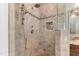 Shower features neutral tile, and a glass enclosure at 116 Hibiscus Dr, Clayton, NC 27527