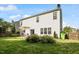 Well-maintained backyard with a patio, green grass, and a privacy fence, ideal for outdoor activities at 1230 Sunday Silence Dr, Knightdale, NC 27545