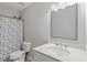 Clean bathroom with a shower/tub combination, a white vanity, and modern fixtures at 1230 Sunday Silence Dr, Knightdale, NC 27545