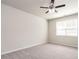 Bedroom featuring carpet flooring, ceiling fan and neutral paint at 1242 Underbrush Dr, Durham, NC 27703