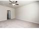 Bright bedroom with a ceiling fan, neutral paint and carpet flooring at 1242 Underbrush Dr, Durham, NC 27703
