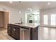 Well-appointed kitchen island with granite countertops, modern fixtures, and open concept design at 1242 Underbrush Dr, Durham, NC 27703