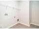 Laundry room features tile floors and includes washer and dryer hookups at 1242 Underbrush Dr, Durham, NC 27703