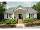 Exterior view of the community clubhouse showcasing the entrance and landscaping at 1276 Dalgarven Dr, Apex, NC 27502