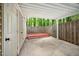 This back porch features a private fence and plenty of shade at 13 Patriot Cir, Durham, NC 27704
