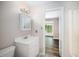 Clean bath features chrome fixtures, and a large doorway to the bedroom at 13 Patriot Cir, Durham, NC 27704