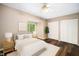 Cozy bedroom with a ceiling fan, large closet, and neutral color scheme at 13 Patriot Cir, Durham, NC 27704