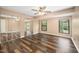 Bedroom features new floors, ample natural light, and a mirrored closet at 13 Patriot Cir, Durham, NC 27704