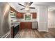 The kitchen offers stainless steel appliances, granite countertops, and abundant cabinet space at 13 Patriot Cir, Durham, NC 27704