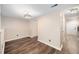Bright living area features new floors and contemporary light fixture at 13 Patriot Cir, Durham, NC 27704