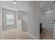 Bedroom with carpet, large windows, and bathroom access at 130 Hilldebrant Dr, Franklinton, NC 27525