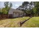 Backyard featuring a patio, swing, and fence at 14 Shire Ct, Zebulon, NC 27597