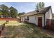 Backyard featuring a patio, swing, and fence at 14 Shire Ct, Zebulon, NC 27597