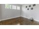 Clean bedroom with hardwood floors and neutral walls at 1429 Wragby Ln, Apex, NC 27502