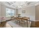 Elegant dining room with coffered ceiling and natural light at 1429 Wragby Ln, Apex, NC 27502