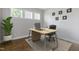 Bright office space with hardwood floors, natural light, and modern desk at 1429 Wragby Ln, Apex, NC 27502