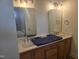 Bathroom showcases a double sink vanity with modern fixtures and large mirrors at 15 Independence Dr, Smithfield, NC 27577