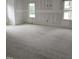 Bedroom ready for the finishing touches with windows letting in natural light at 15 Independence Dr, Smithfield, NC 27577
