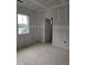 Bedroom is ready for paint with windows and trim at 15 Independence Dr, Smithfield, NC 27577